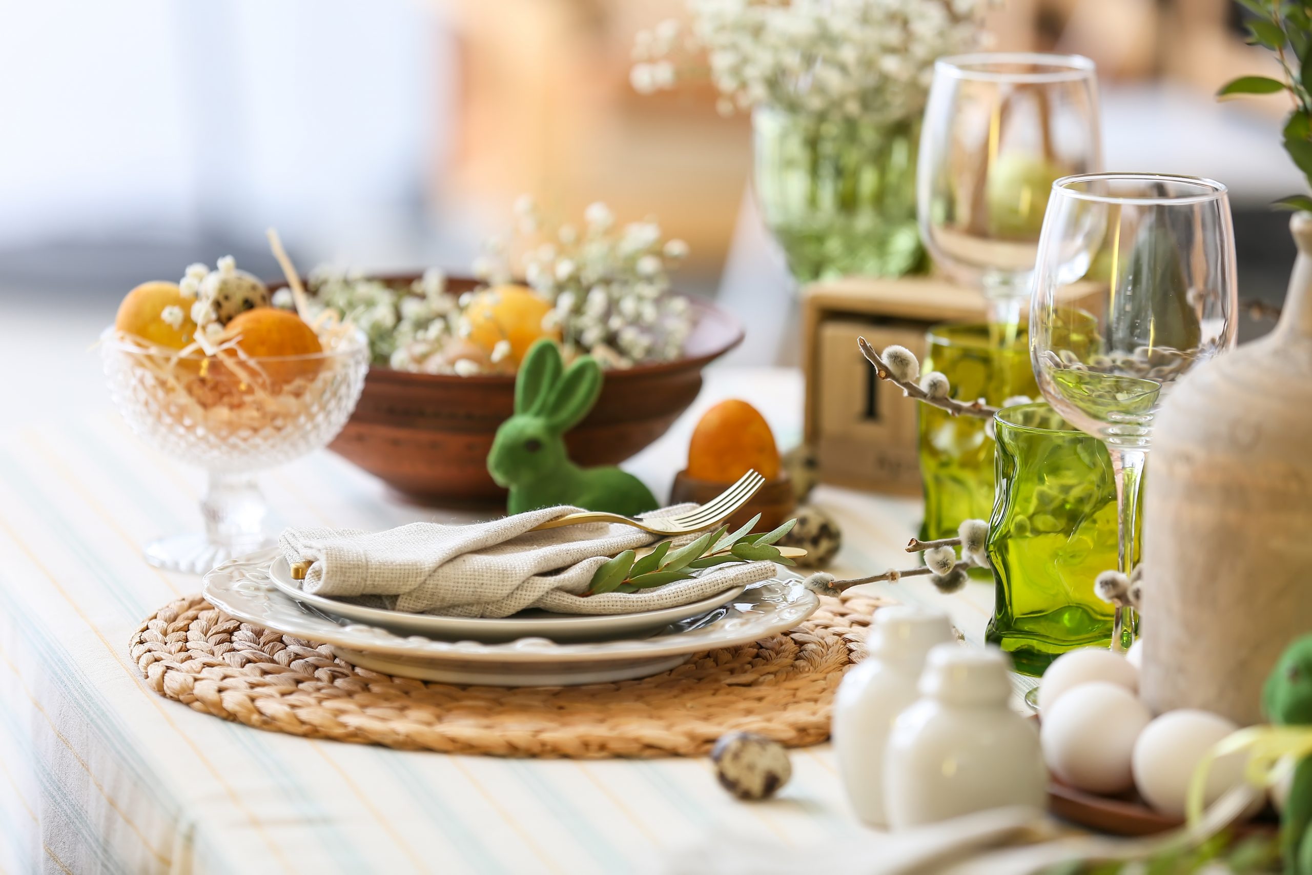 Plates,With,Napkin,,Cutlery,And,Eucalyptus,Branch,On,Table,Served